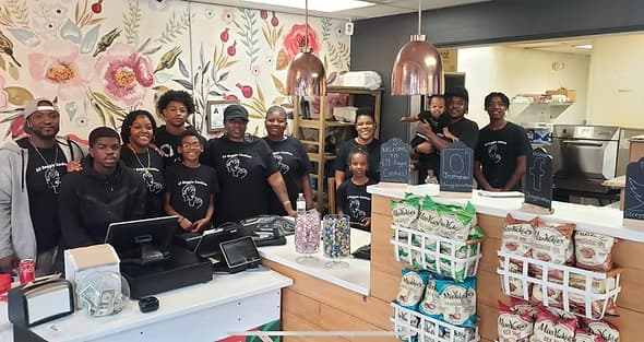 Grand opening staff that helped Lil Reggie